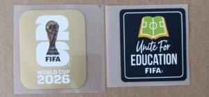 Set de parches WC 26 dorado + UNITE FOR EDUCATION negro