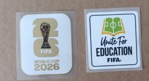 Set de parches WC 26 blanco con dorado + UNITE FOR EDUCATION blanco