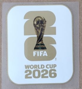 Parche WORLD CUP 2026 blanco con dorado